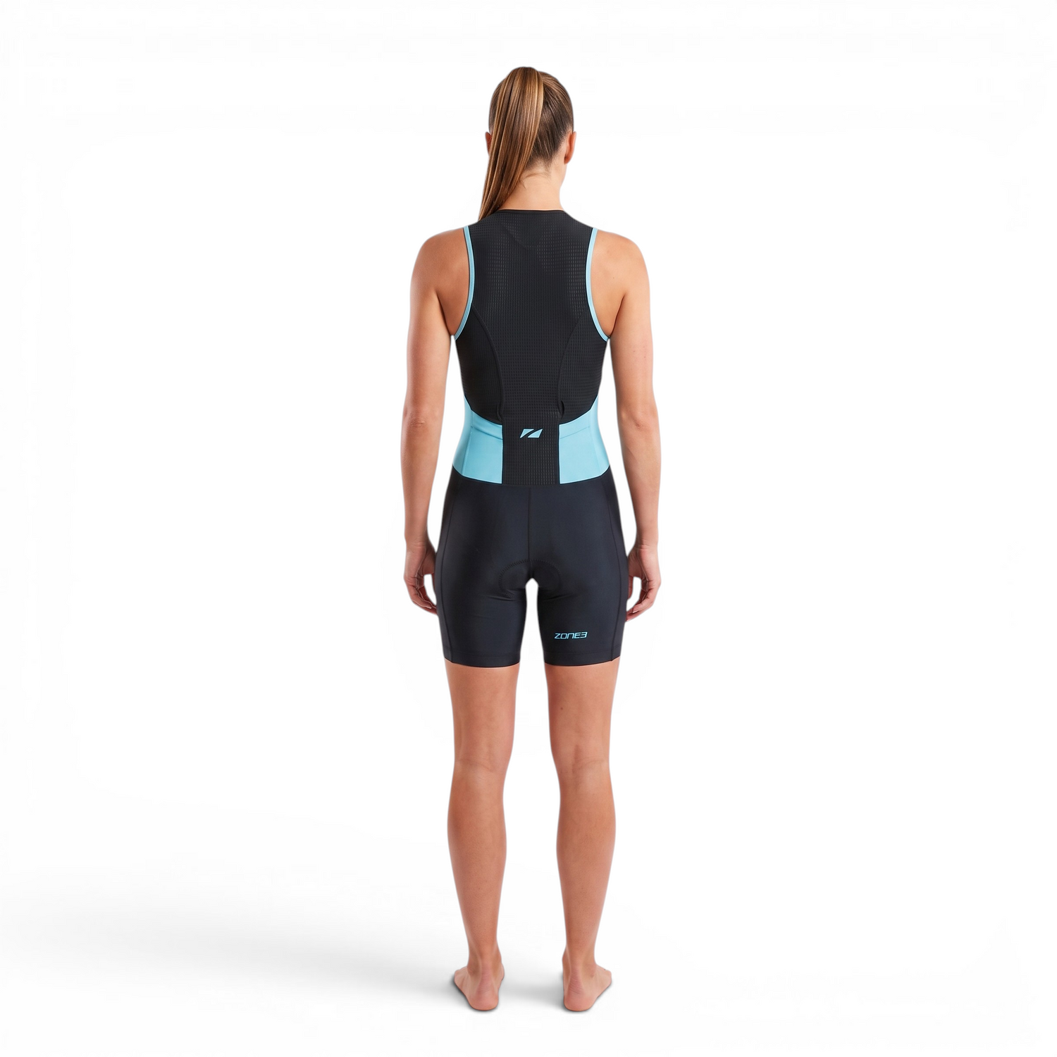 A woman wearing the Zone3 Activate trisuit on a white background.