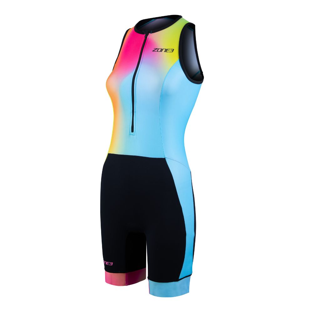 Front view of a sleeveless triathlon trisuit with a gradient design in pink, yellow, and blue. Features a black lower half and a front zipper.