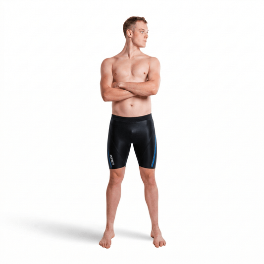 A man wearing the Zone3 Originals 5/3mm buoyancy shorts on a white background.