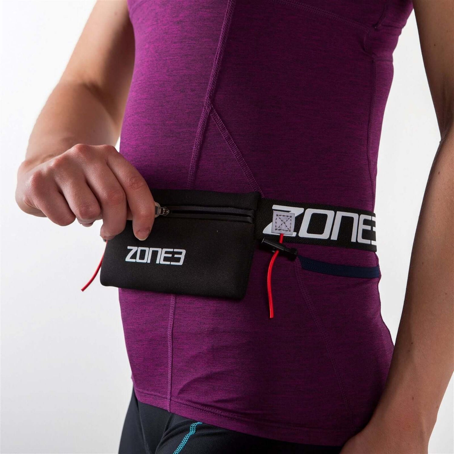A Zone3 Endurance race number belt with neoprene fuel pouch on a white background.