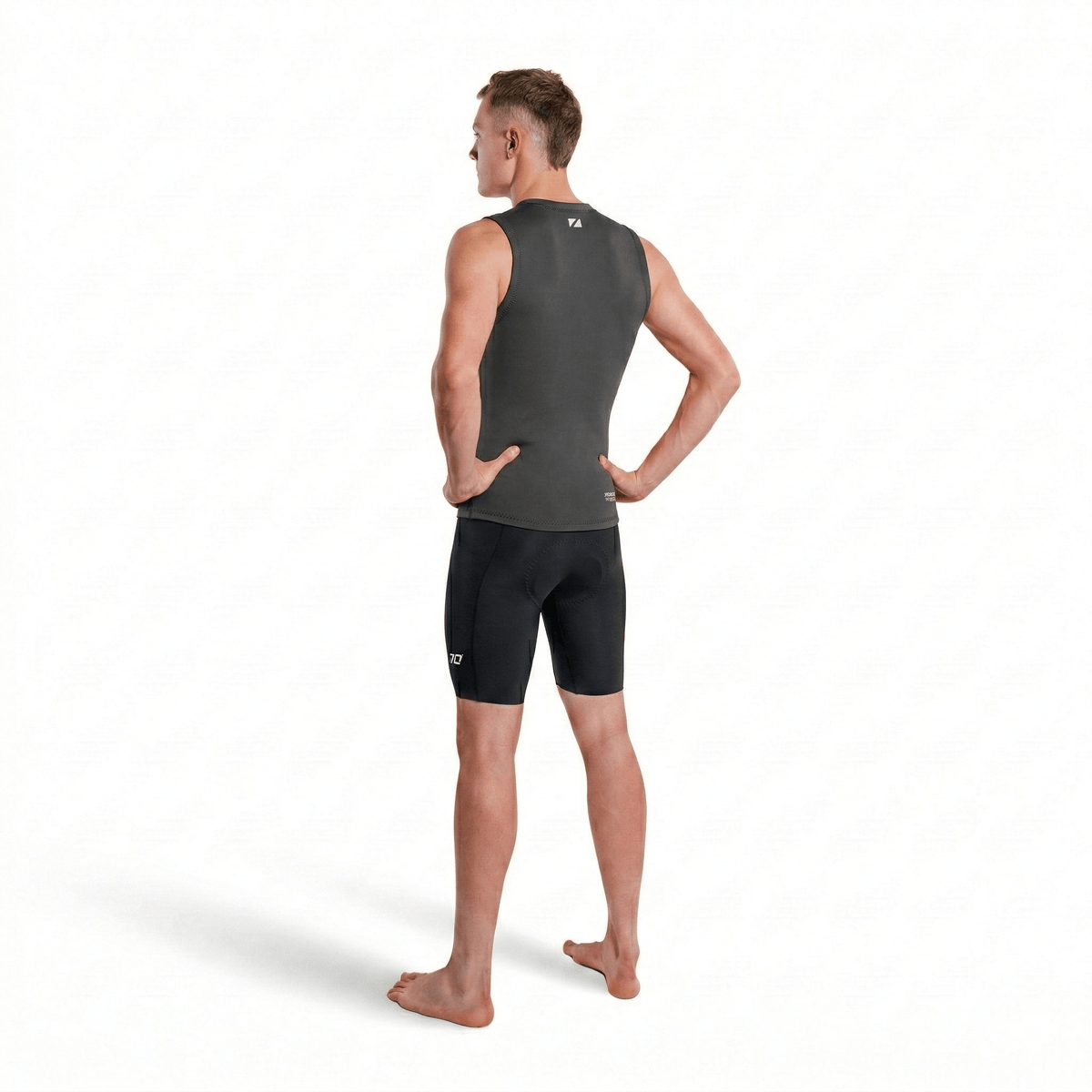 Man wearing black Zone3 Lava shorts on a white background from the back 