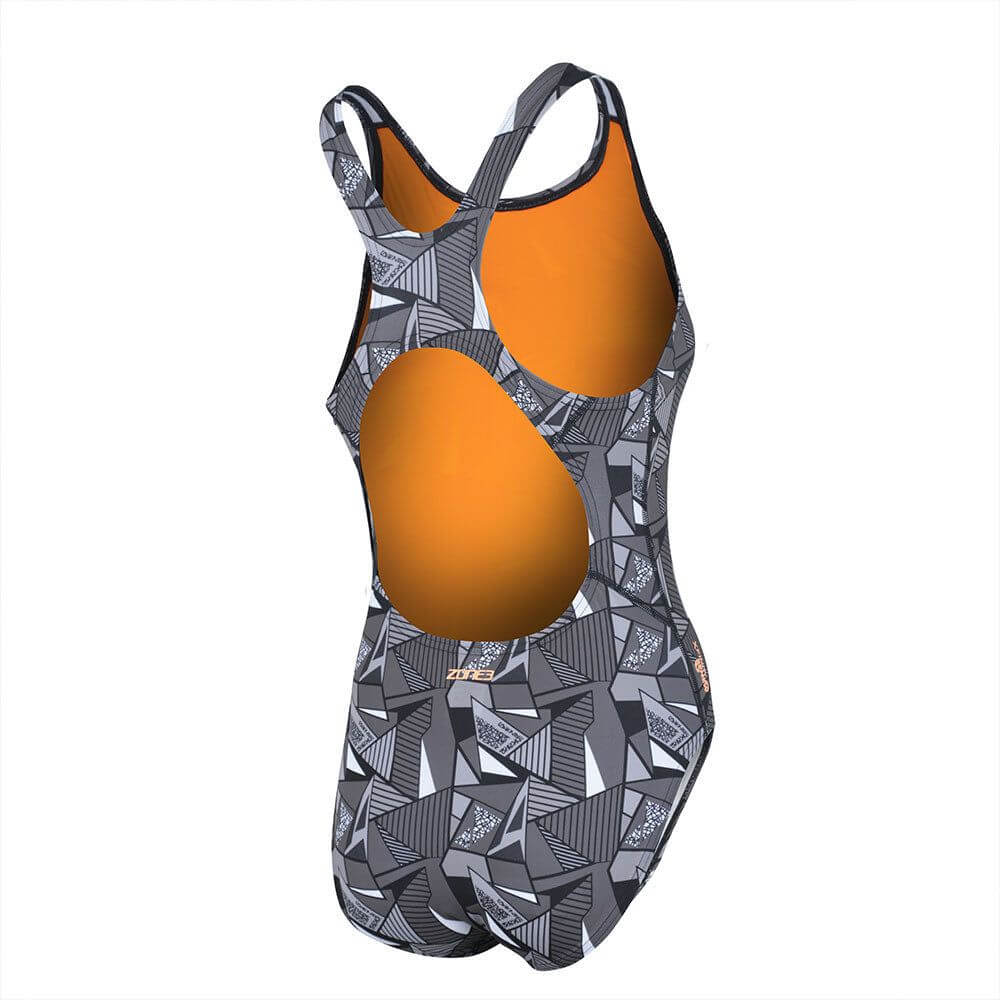 A woman wearing the Zone3 OWS Renew classic swimsuit on a white background.