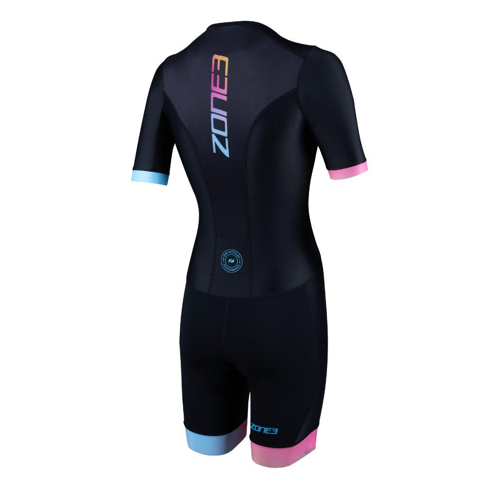 Back view of the ZONE3 Activate+ women's short sleeve trisuit in black, with a vertical ZONE3 logo in gradient colours and contrasting pink and blue cuffs.