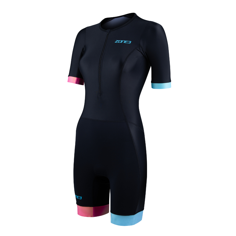 Front view of the ZONE3 Activate+ women's short sleeve trisuit in black, featuring a blue ZONE3 logo, front zip, and pink and blue sleeve and leg cuffs.