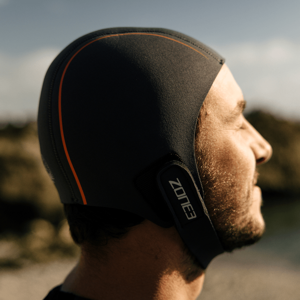 Active-Flex Swim Cap worn by a man outdoors, ideal for swimming and water sports for head insulation.