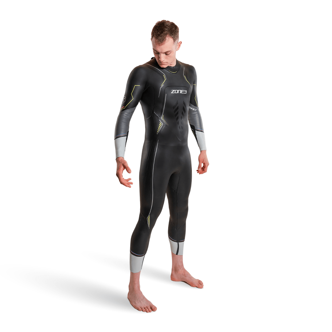 Aspire triathlon Wetsuit worn by a male model displaying its sleek design and performance features.