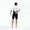 A man wearing the Zone3 Lava full zip short sleeve trisuit on a white background.