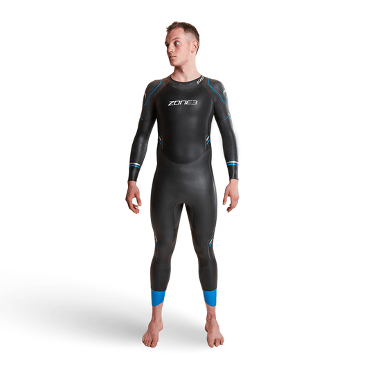 Advance wetsuit worn by a model black full length wetsuit with blue accents on sleeves and calves