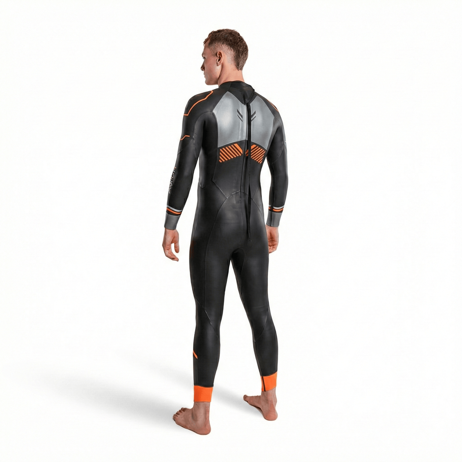 Back view of a Thermal Aspire wetsuit worn by a person, black with gray panels and orange trim.