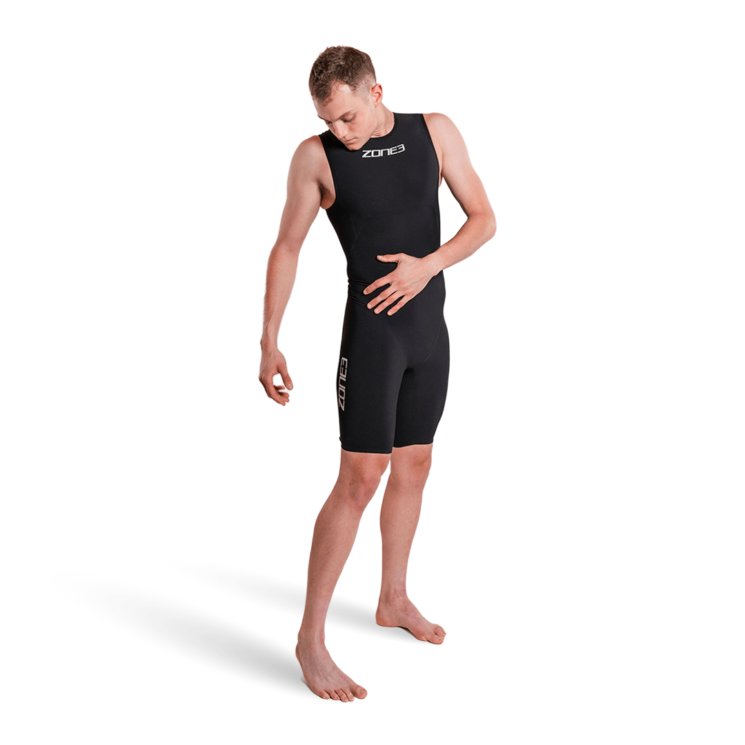 Male model wearing black Streamline Sleeveless Swimskin with Zone3 logo on the chest